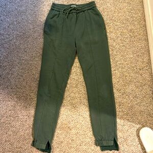 High waisted green sweats with pockets